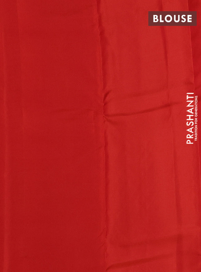 Kanchipuram silk saree black and pinkish orange with copper zari woven buttas in borderless style