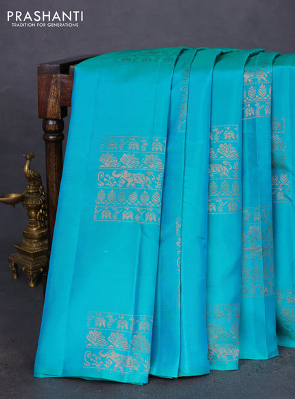 Kanchipuram silk saree dual shade of teal greenish blue and mustard yellow with copper zari woven buttas in borderless style