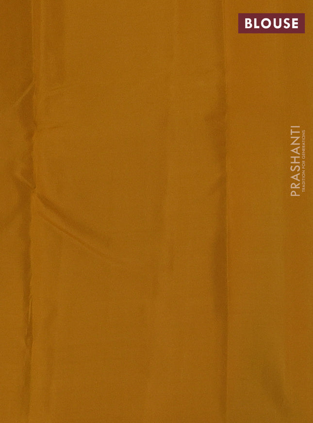 Kanchipuram silk saree dual shade of teal greenish blue and mustard yellow with copper zari woven buttas in borderless style