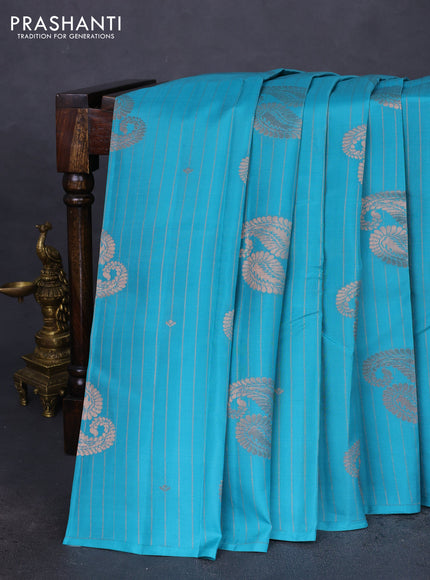 Kanchipuram silk saree teal blue and pink with allover copper zari weaves in borderless style