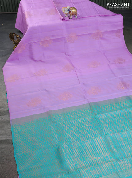 Kanchipuram silk saree lavender and teal blue with allover copper zari weaves in borderless style