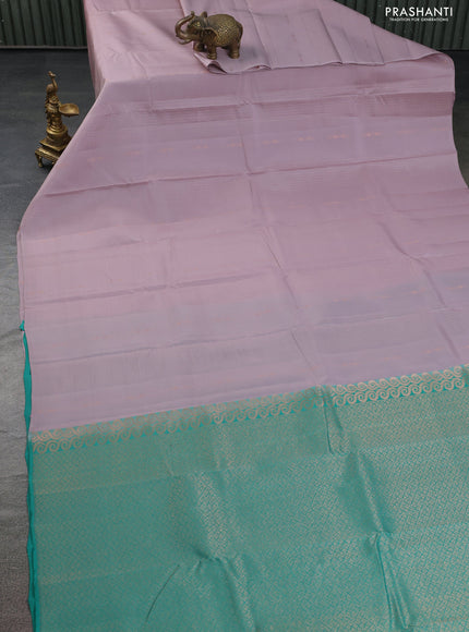 Kanchipuram silk saree pastel pink and teal green with allover copper zari weaves & buttas in borderless style
