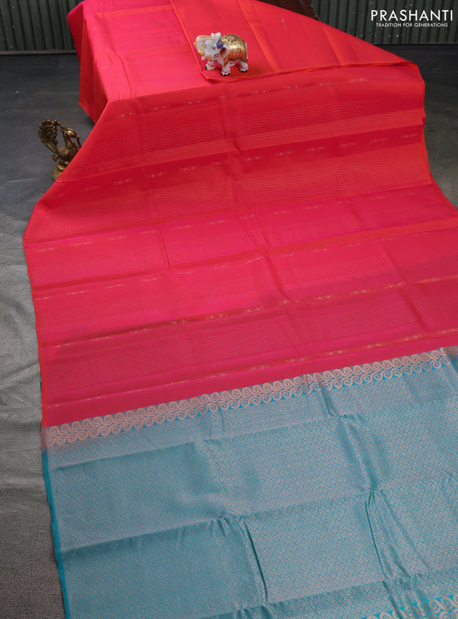 Kanchipuram silk saree dual shade of pink and teal green with allover copper zari weaves in borderless style
