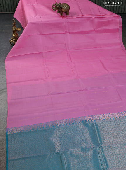 Kanchipuram silk saree light pink and teal green with allover copper zari weaves & buttas in borderless style