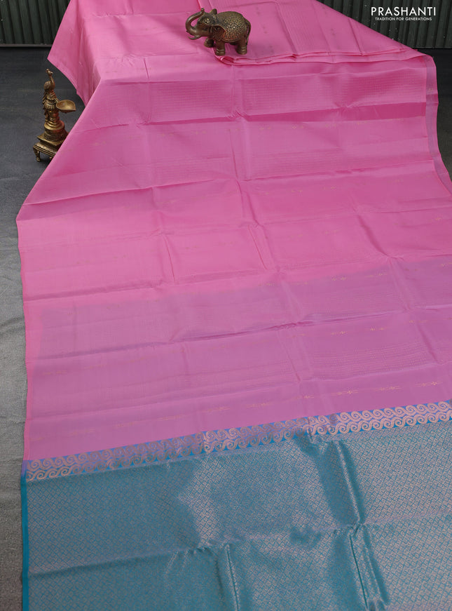 Kanchipuram silk saree light pink and teal green with allover copper zari weaves & buttas in borderless style