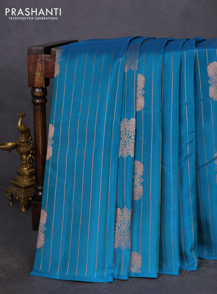 Kanchipuram silk saree peacock blue and mustard yellow with allover copper zari weaves & buttas in borderless style
