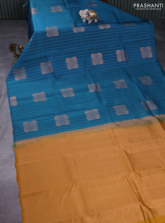 Kanchipuram silk saree peacock blue and mustard yellow with allover copper zari weaves & buttas in borderless style