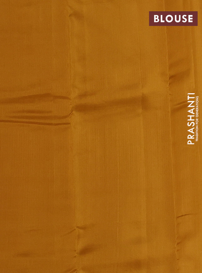 Kanchipuram silk saree peacock blue and mustard yellow with allover copper zari weaves & buttas in borderless style