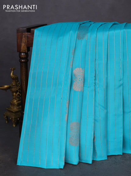 Kanchipuram silk saree teal blue and pink with allover copper zari weaves & buttas in borderless style