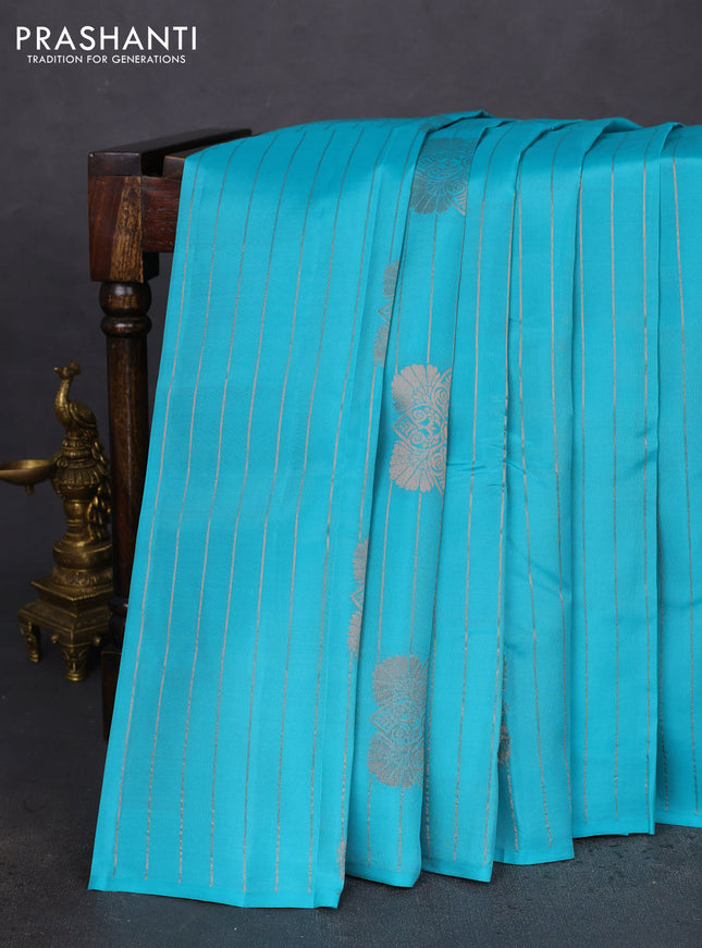 Kanchipuram silk saree teal blue and pink with allover copper zari weaves & buttas in borderless style