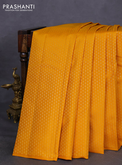 Kanchipuram silk saree mustard yellow with allover zari weaves in borderless style