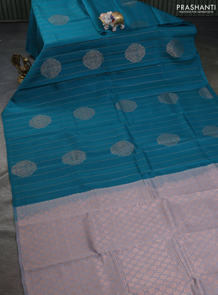Kanchipuram silk saree teal green and grey with allover copper zari weaves in borderless style