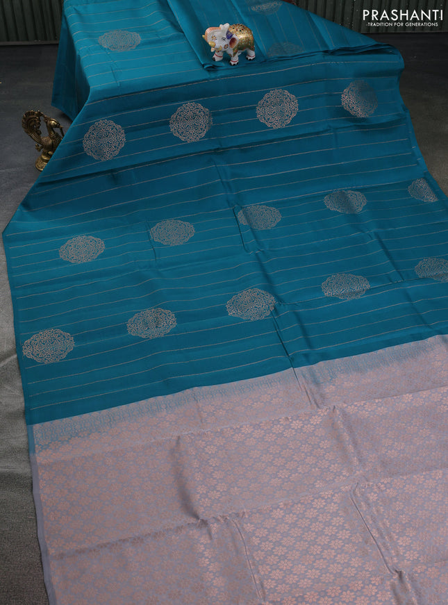 Kanchipuram silk saree teal green and grey with allover copper zari weaves in borderless style