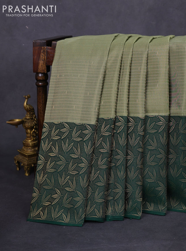 Kanchipuram soft silk saree pastel green and green with allover zari weaves and rich zari woven border
