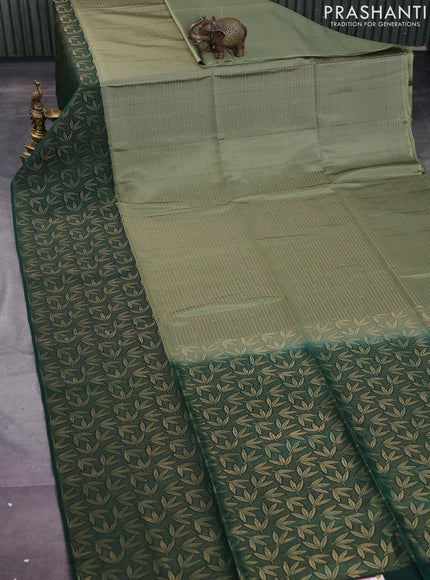 Kanchipuram soft silk saree pastel green and green with allover zari weaves and rich zari woven border