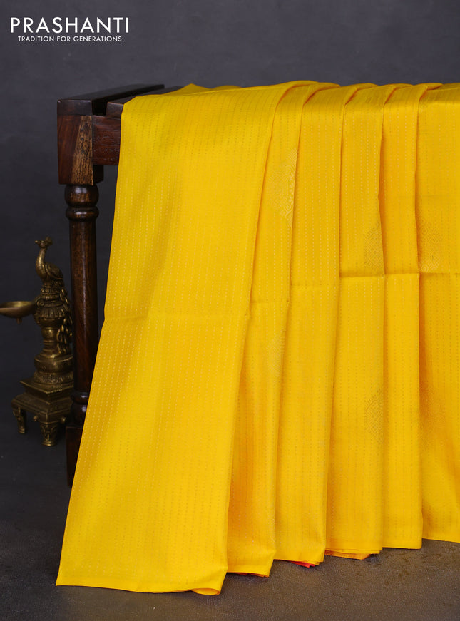 Kanchipuram soft silk saree yellow and dual shade of pinkish orange with allover zari weaves in borderless style