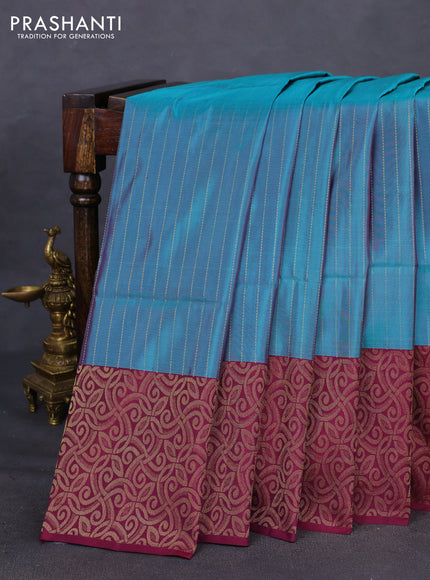 Kanchipuram soft silk saree dual shade of teal green and wine shade with allover zari weaves in borderless style