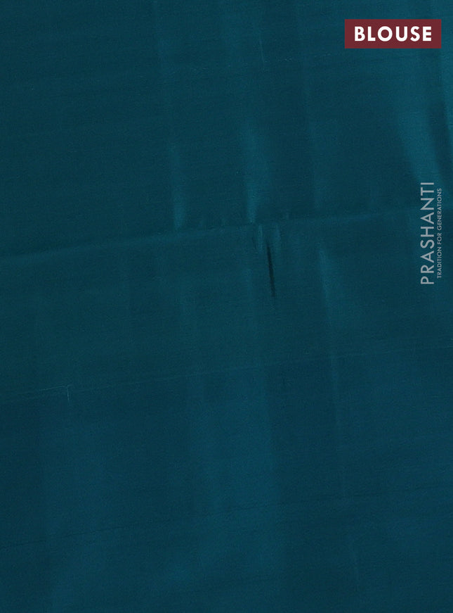 Kanchipuram soft silk saree dark magenta pink and teal green shade with allover zari woven buttas and rich zari woven border