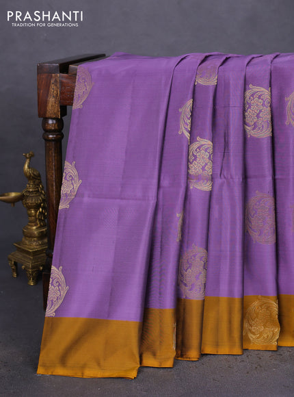 Kanchipuram soft silk saree pastel purple and dark mustard with zari woven buttas and zari woven butta border