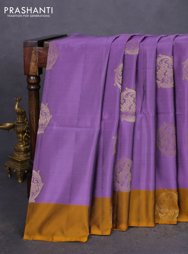Kanchipuram soft silk saree pastel purple and dark mustard with zari woven buttas and zari woven butta border
