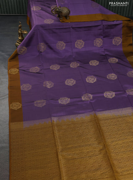 Kanchipuram soft silk saree pastel purple and dark mustard with zari woven buttas and zari woven butta border