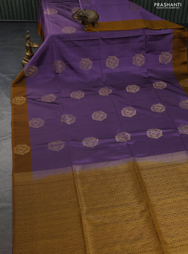 Kanchipuram soft silk saree pastel purple and dark mustard with zari woven buttas and zari woven butta border