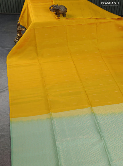 Kanchipuram soft silk saree yellow and pastel green with allover zari weaves in borderless style