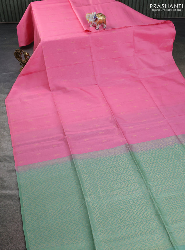 Kanchipuram soft silk saree light pink and pastel green with allover zari weaves in borderless style