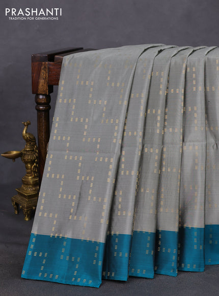 Kanchipuram soft silk saree grey and teal blue with allover zari weaves and zari woven border