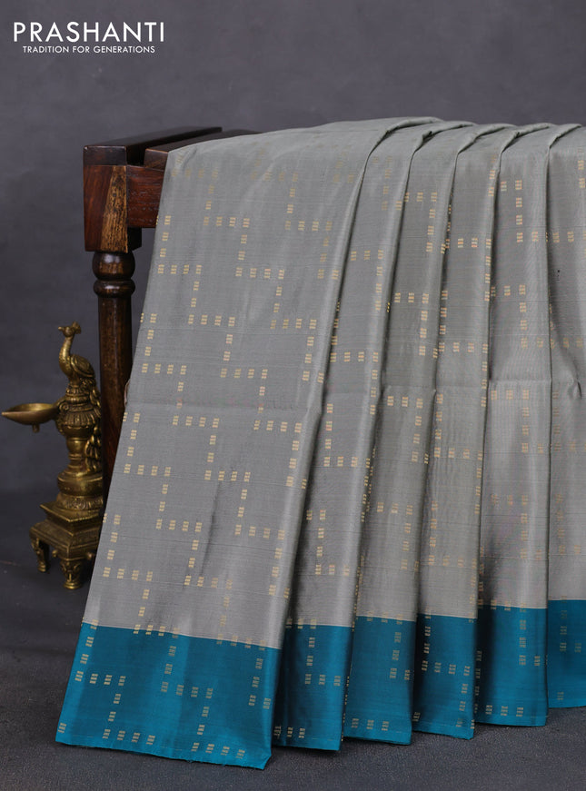 Kanchipuram soft silk saree grey and teal blue with allover zari weaves and zari woven border