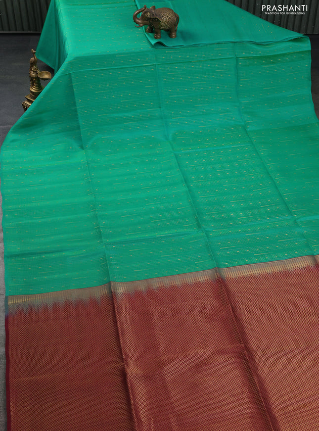 Kanchipuram soft silk saree teal green and maroon with allover zari weaves in borderless style