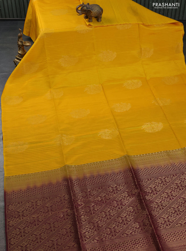 Kanchipuram soft silk saree yellow and deep maroon with zari woven buttas in borderless style