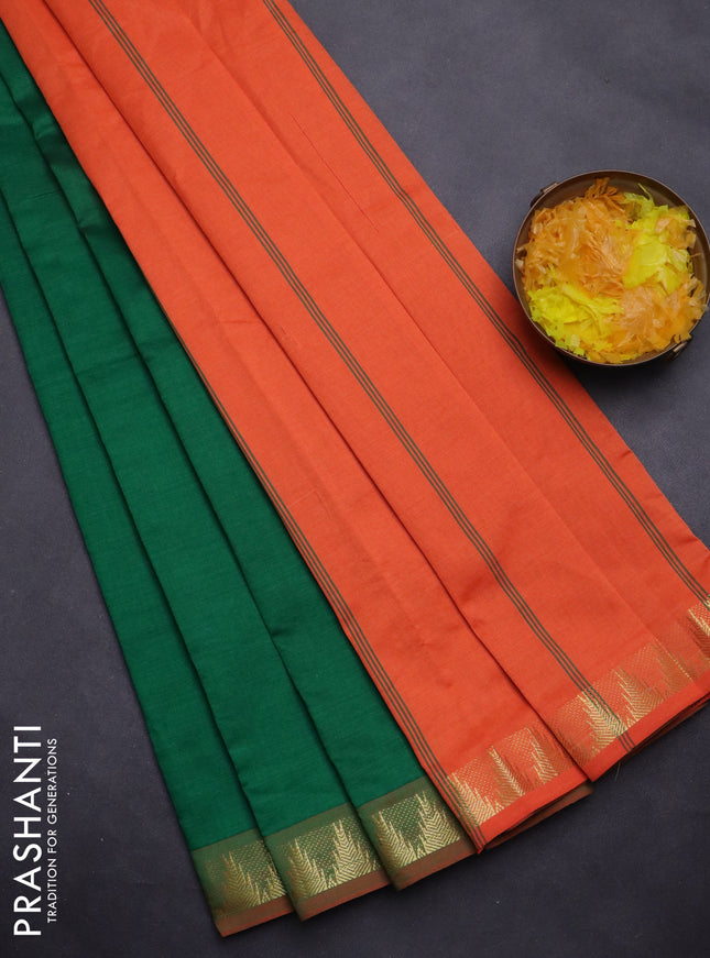 Semi silk cotton saree green and orange with plain body and zari woven border
