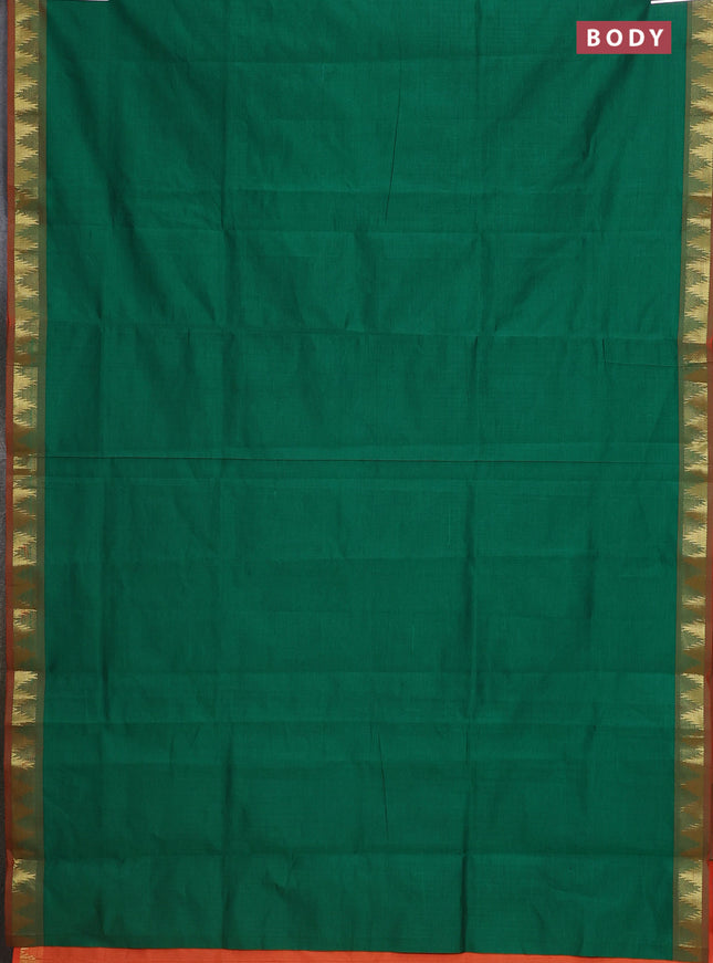 Semi silk cotton saree green and orange with plain body and zari woven border