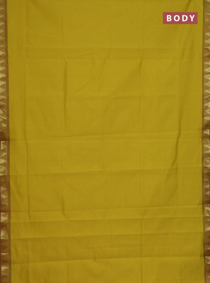 Semi silk cotton saree yellow and red with plain body and zari woven border