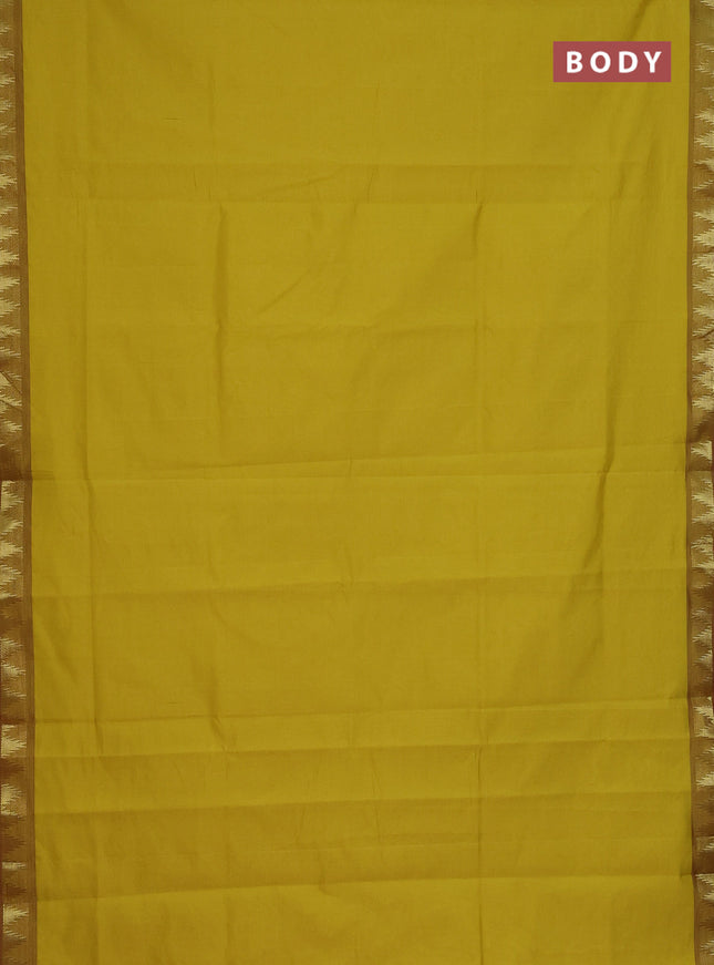 Semi silk cotton saree yellow and red with plain body and zari woven border