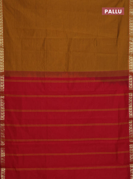 Semi silk cotton saree dark mustard and red with plain body and zari woven border