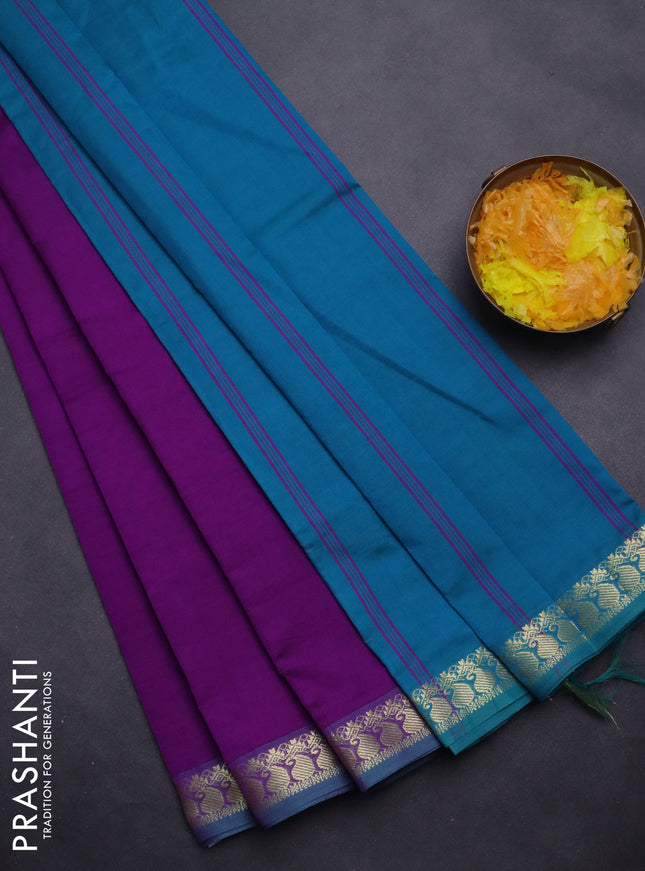 Semi silk cotton saree purple and teal blue with plain body and zari woven border