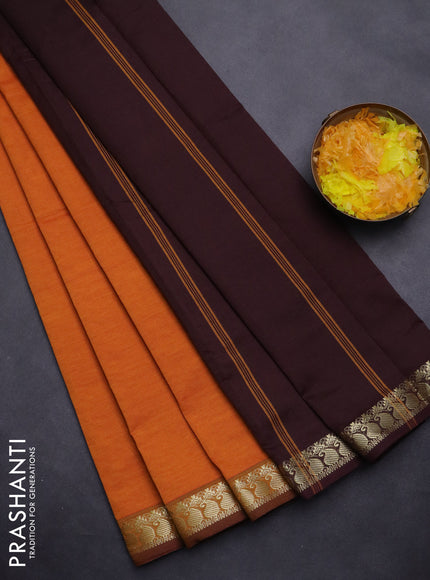Semi silk cotton saree dark mustard and coffee brown with plain body and zari woven border