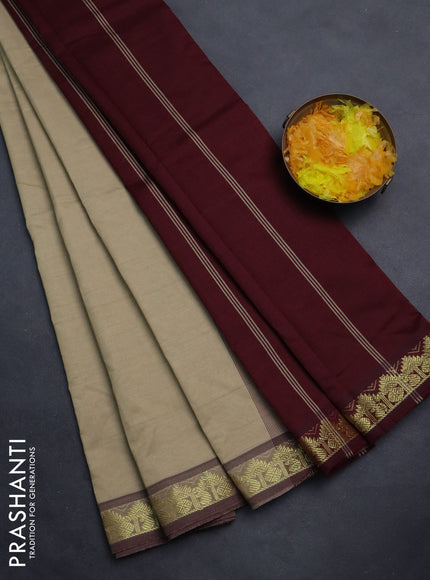 Semi silk cotton saree beige and deep maroon with plain body and zari woven border