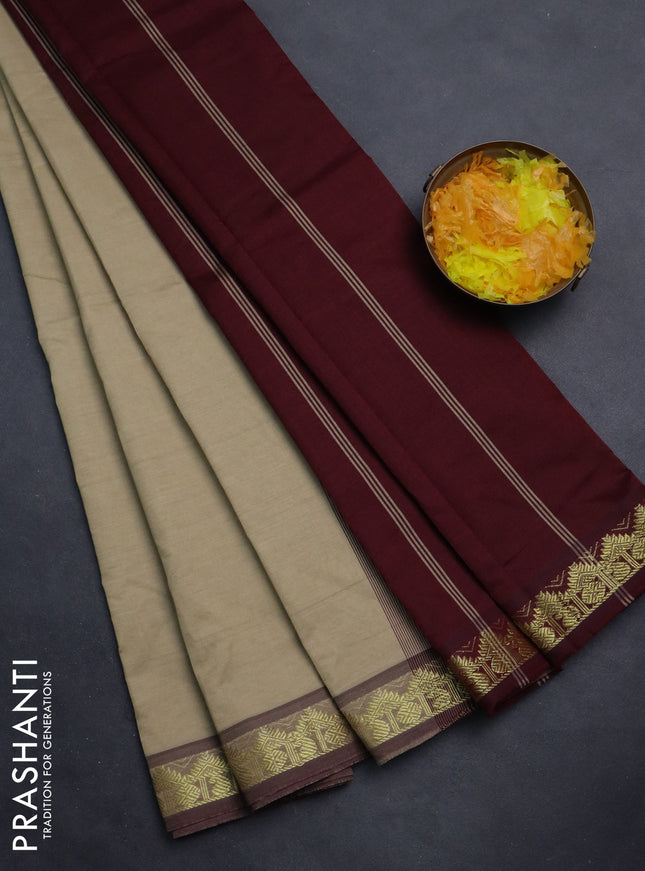 Semi silk cotton saree beige and deep maroon with plain body and zari woven border