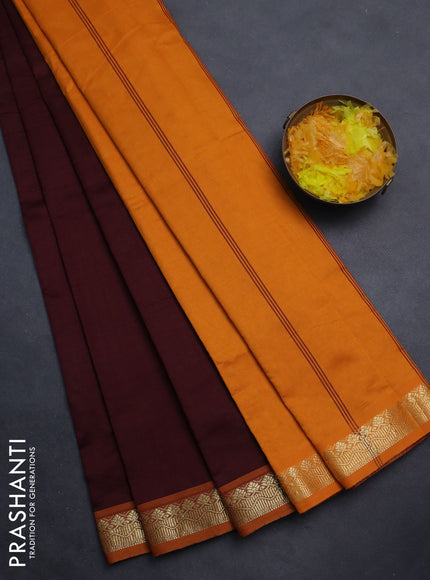 Semi silk cotton saree deep maroon and orange with plain body and zari woven border