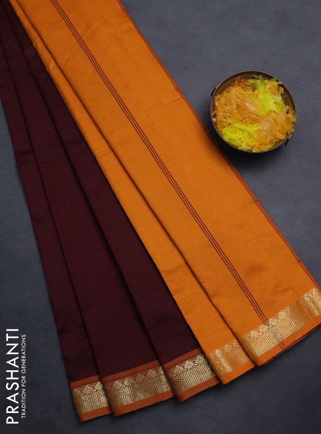 Semi silk cotton saree deep maroon and orange with plain body and zari woven border