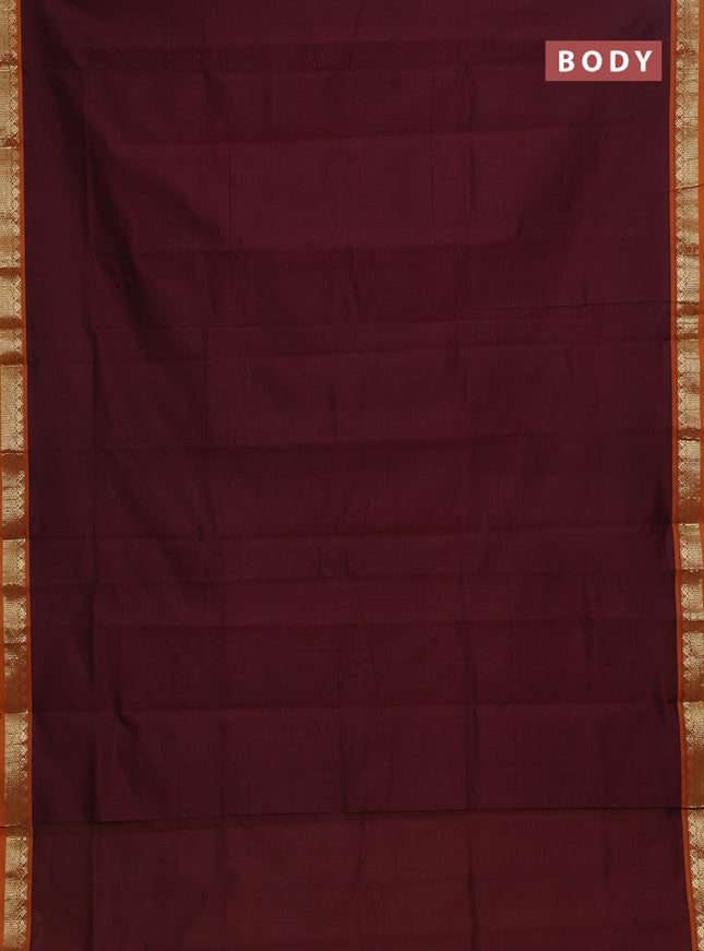 Semi silk cotton saree deep maroon and orange with plain body and zari woven border
