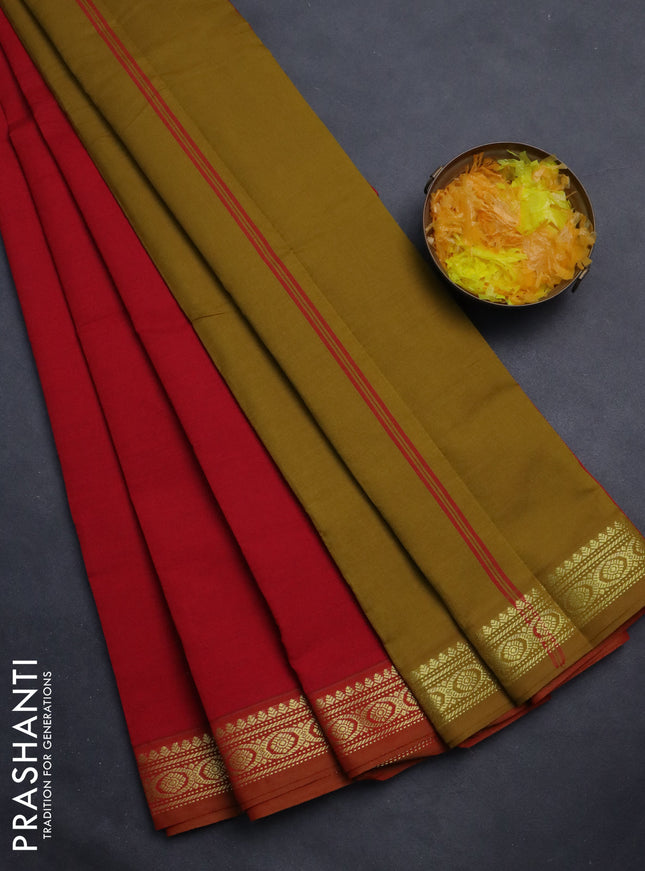 Semi silk cotton saree red and dark mustrad with plain body and zari woven border