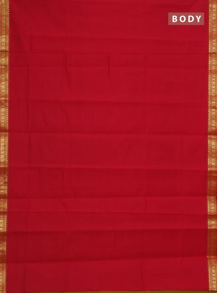 Semi silk cotton saree red and dark mustrad with plain body and zari woven border