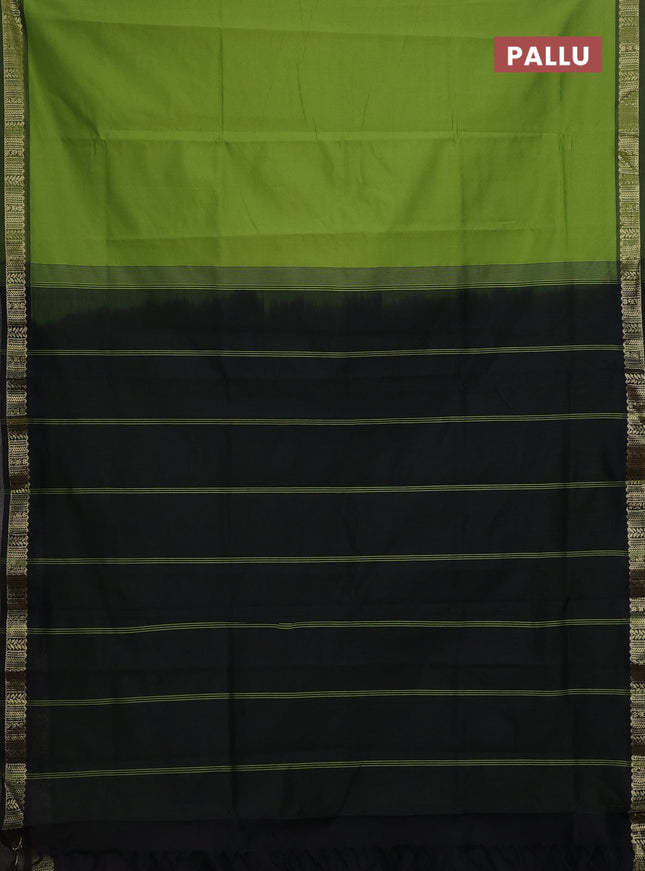 Semi silk cotton saree green and black with plain body and zari woven border