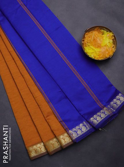 Semi silk cotton saree mustard yellow and blue with plain body and zari woven border