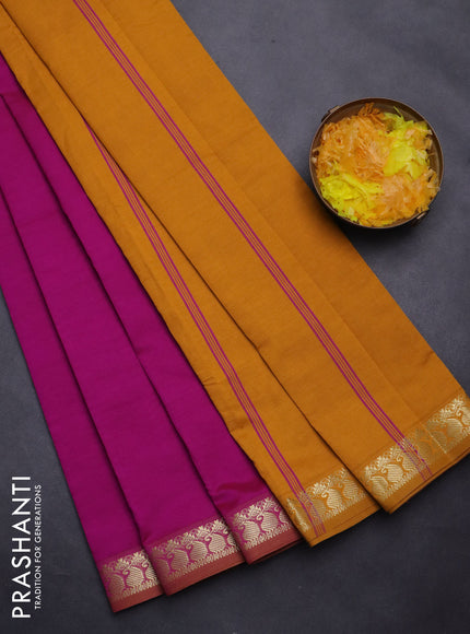 Semi silk cotton saree magenta pink and mustard yellow with plain body and zari woven border