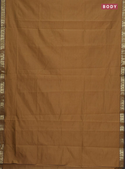 Semi silk cotton saree dark sandal and blue with plain body and zari woven border